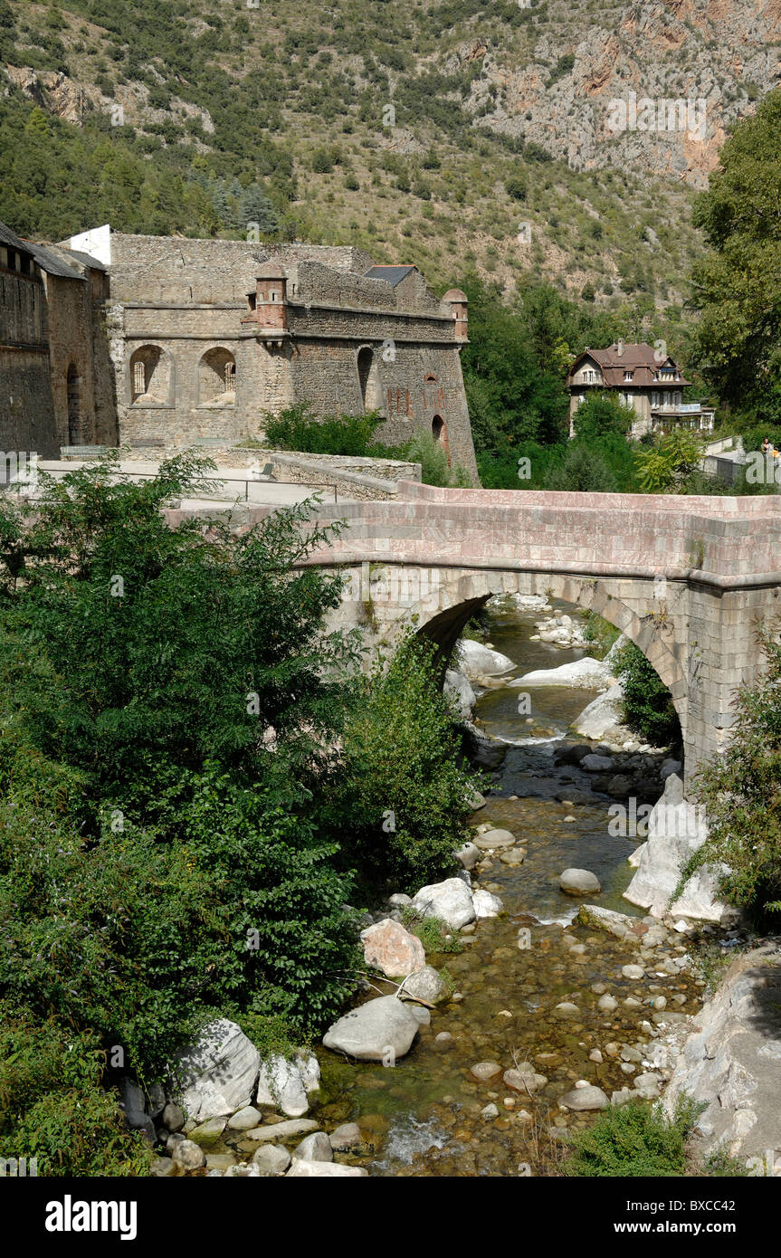 Stone Bridge at Town Gate, Fortified Town of Villefranche-de-Conflent with Fortifications by Vauban Pyrenees-Orientales, France Stock Photo