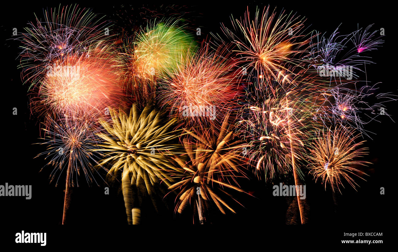 Bright and colorful fireworks against a black night sky Stock Photo