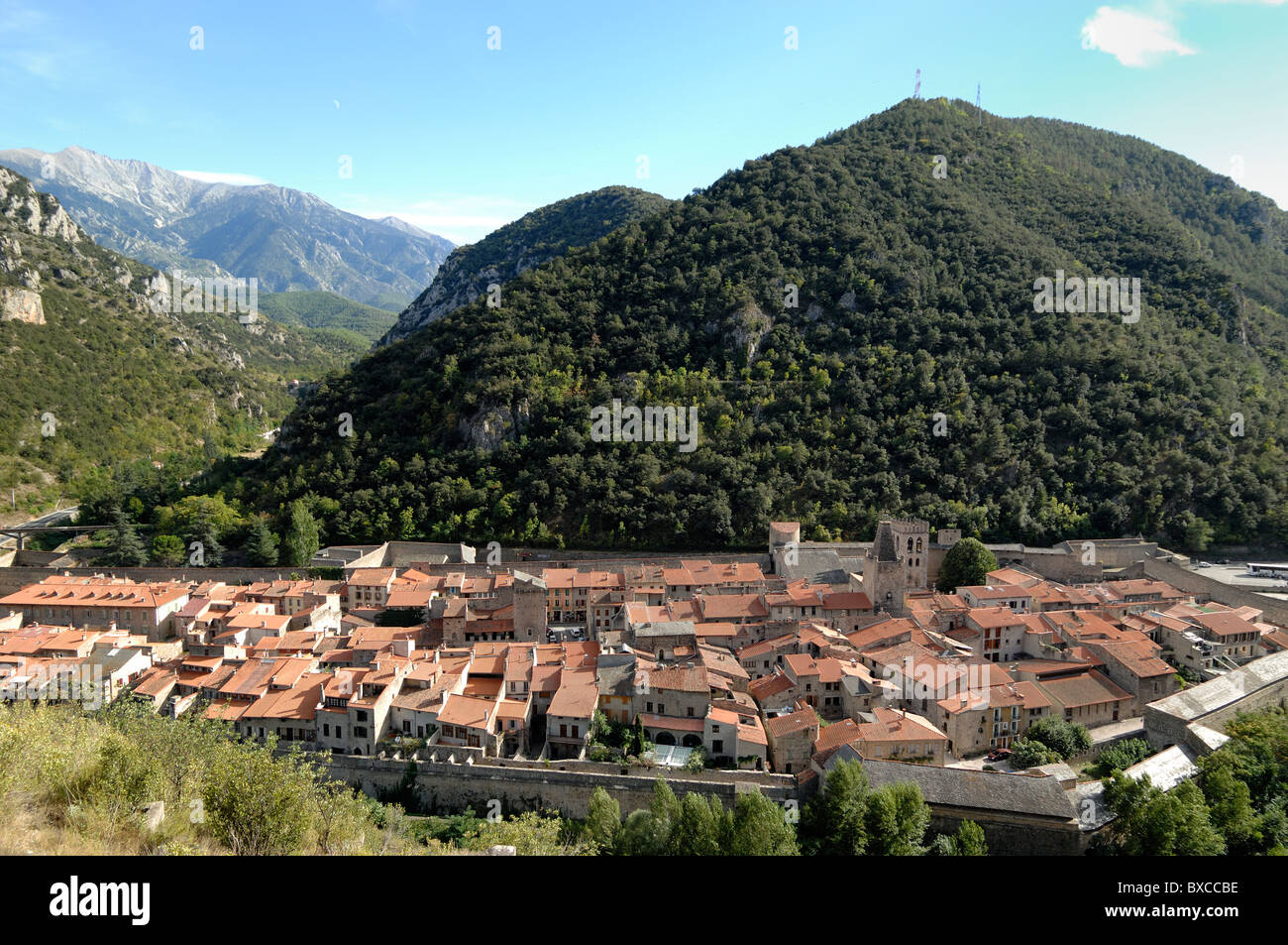 Aerial View or High-Angle View over the Fortified Town of Villefranche-de-Conflent with Fortifications by Vauban, Pyrenees-Orientales, France Stock Photo