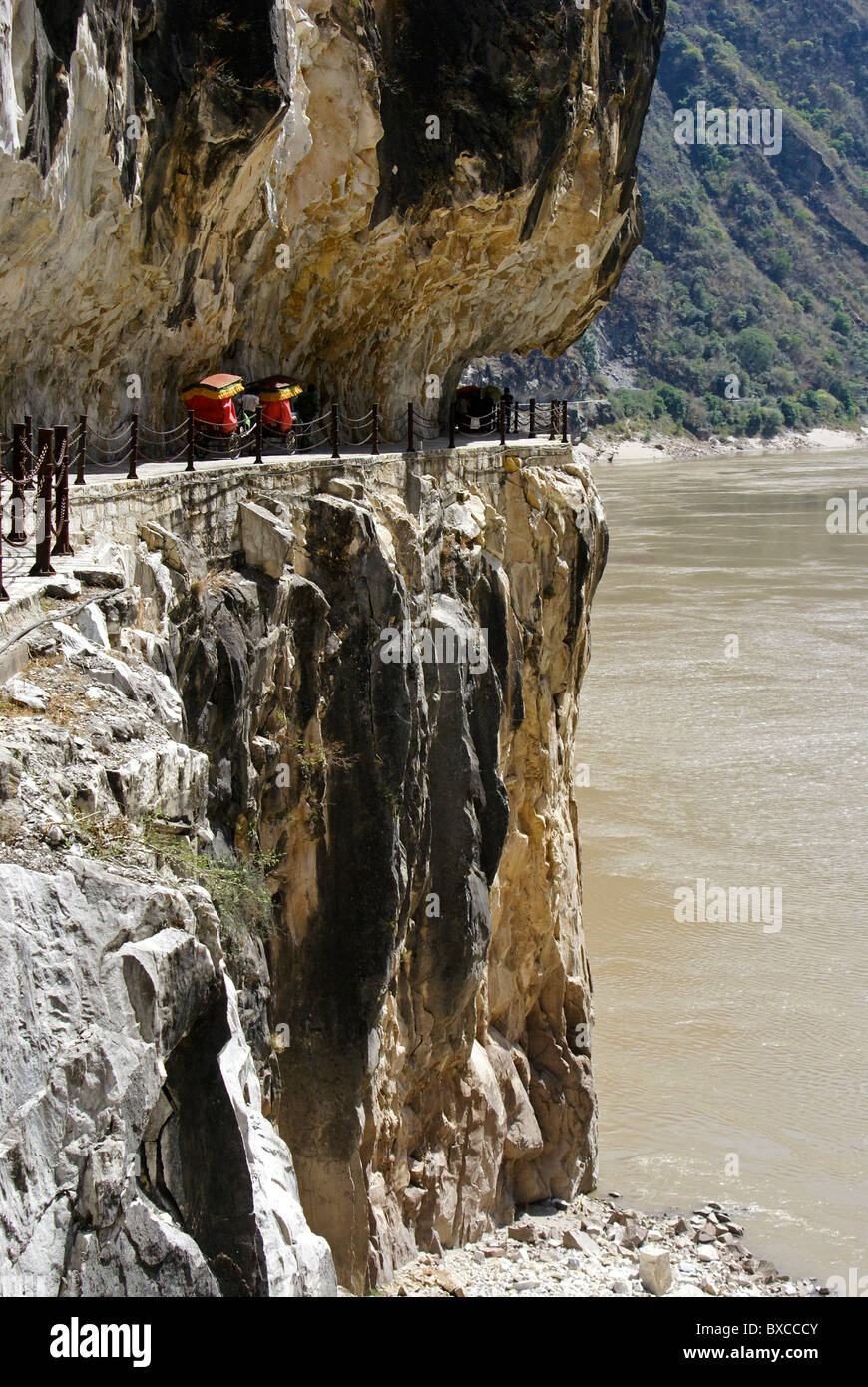 Rickshaws on path at Tiger Leaping Gorge, Yunnan, China Stock Photo