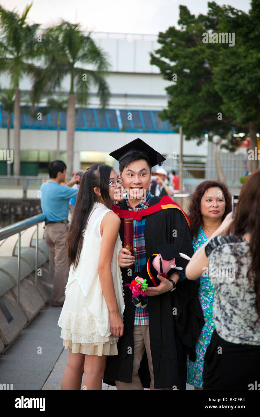 Hong Kong graduation day celebrated by graduate and girlfriend as they