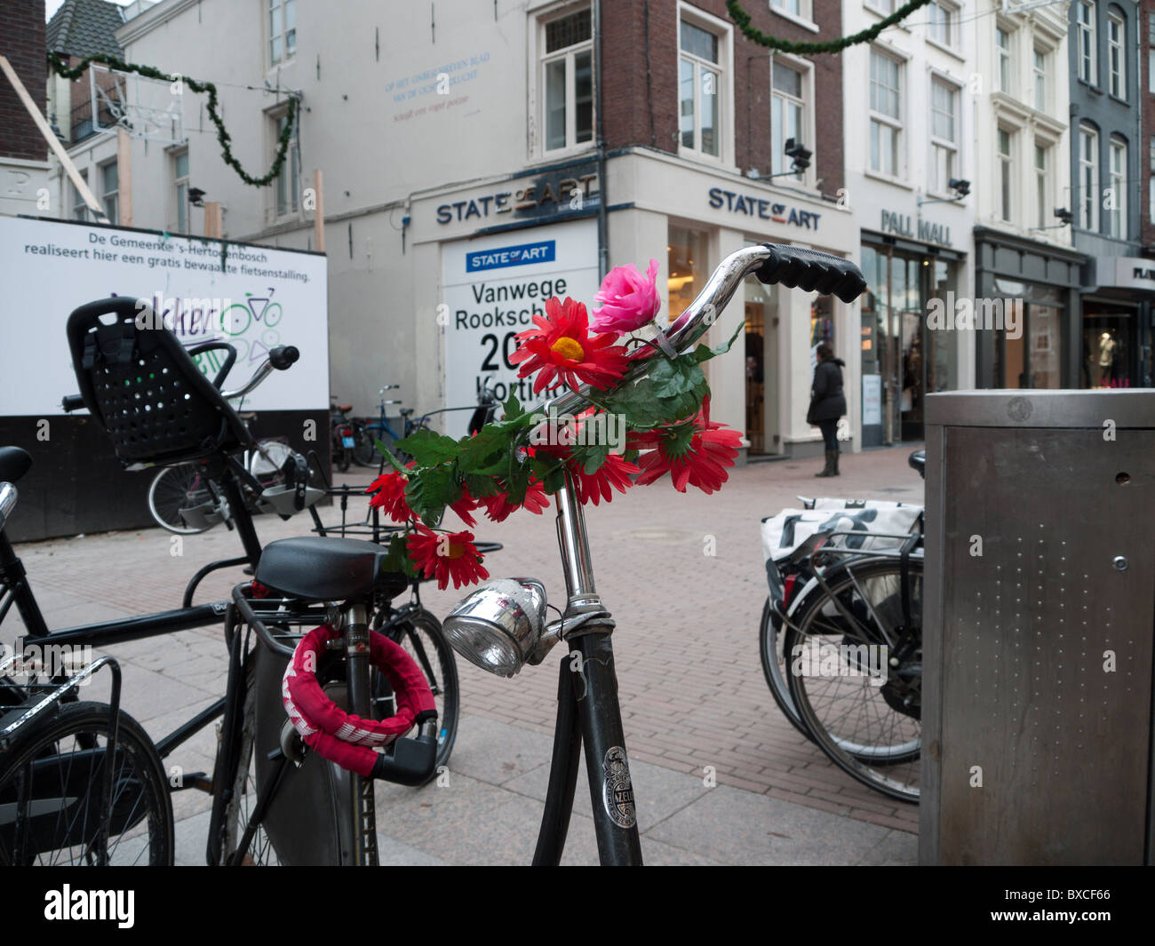 flower decorated handlebars on a bicycle in  's-Hertogenbosh ( Den Bosch ) Netherlands Stock Photo