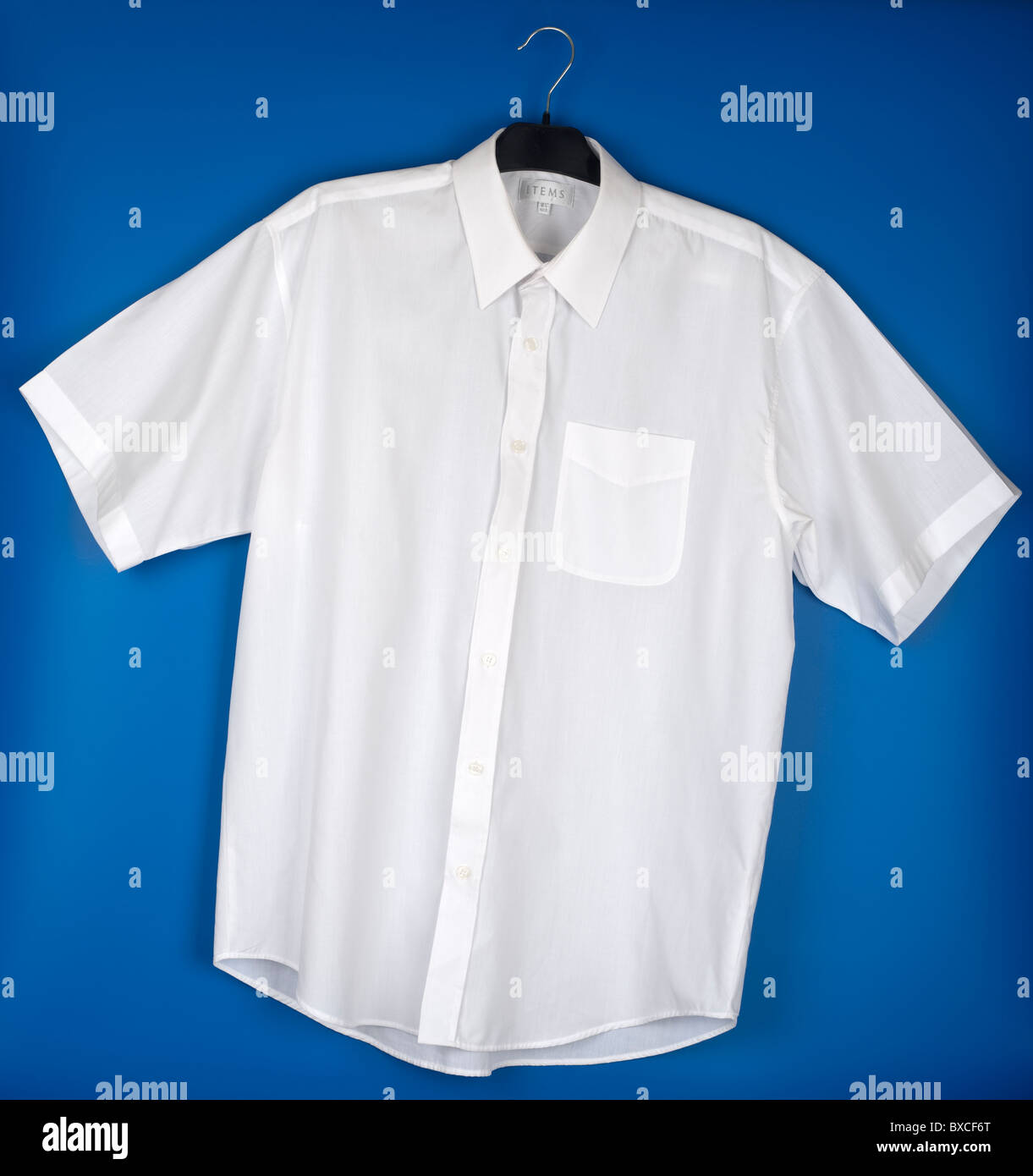 White shirt on hanger hi-res stock photography and images - Alamy