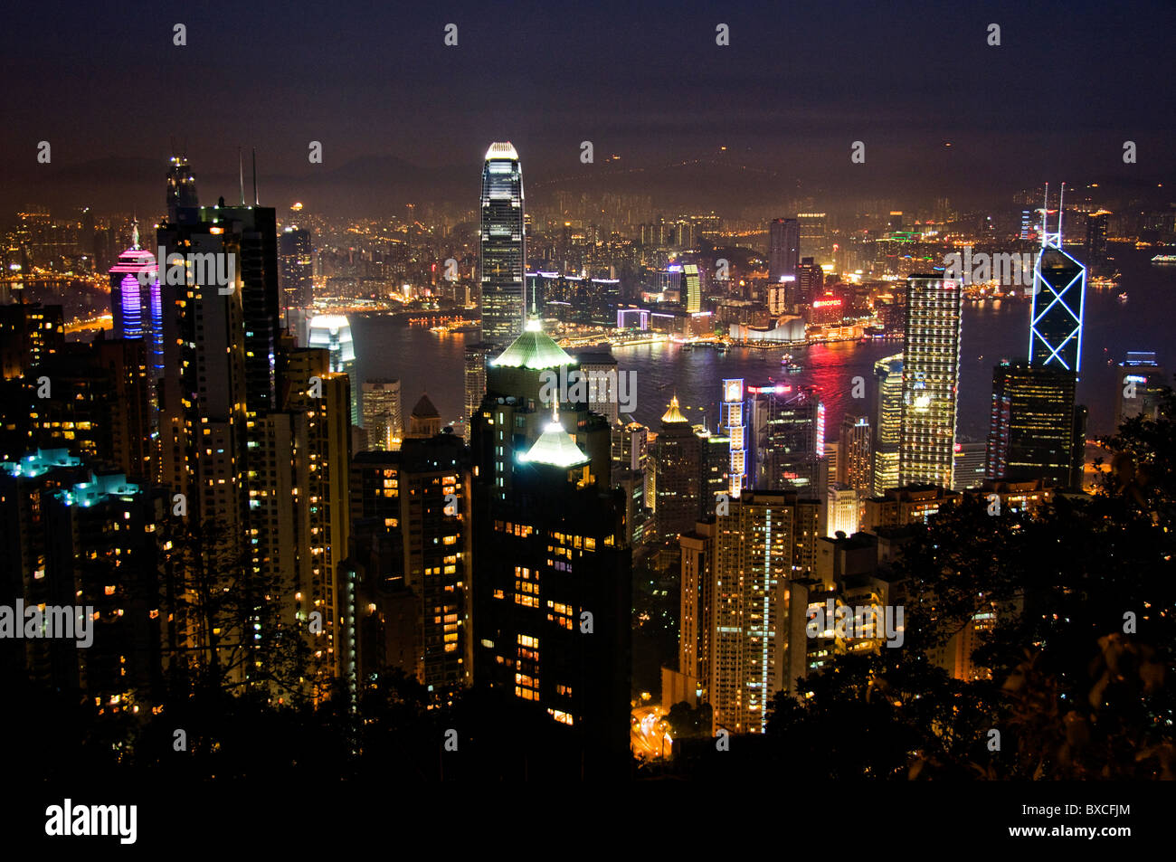 City skyline of downtown Hong Kong China at night from Victoria Peak Stock Photo