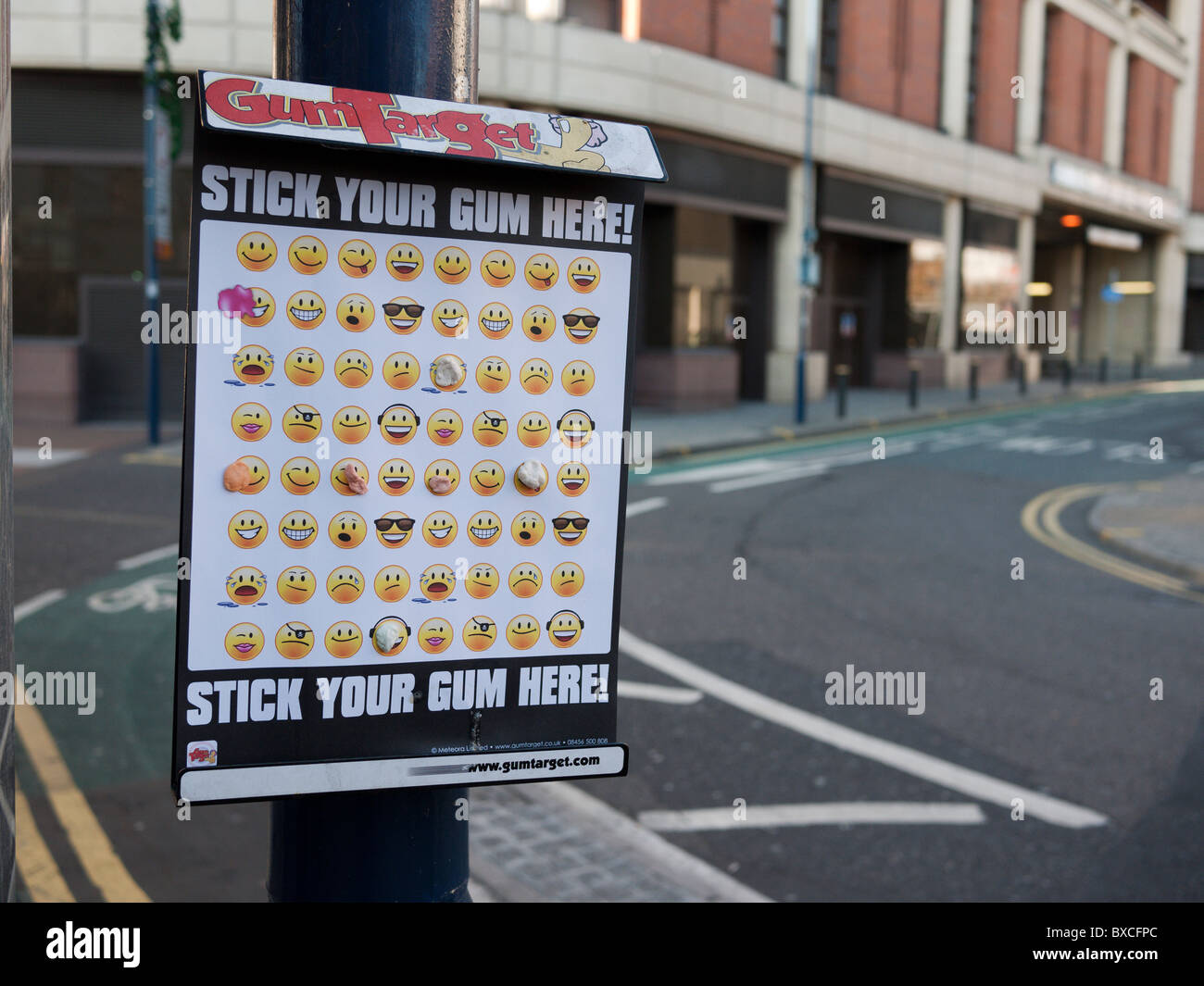 a stick your gum here board gum target in Kingston Surrey Stock Photo