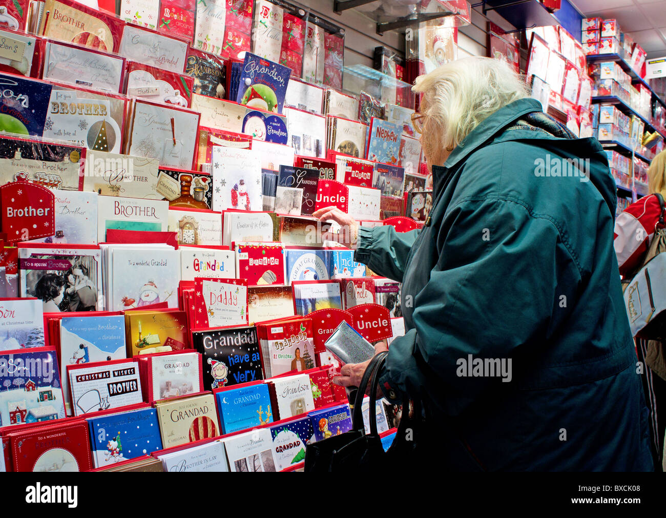 Woman buying greeting cards hi-res stock photography and images - Alamy