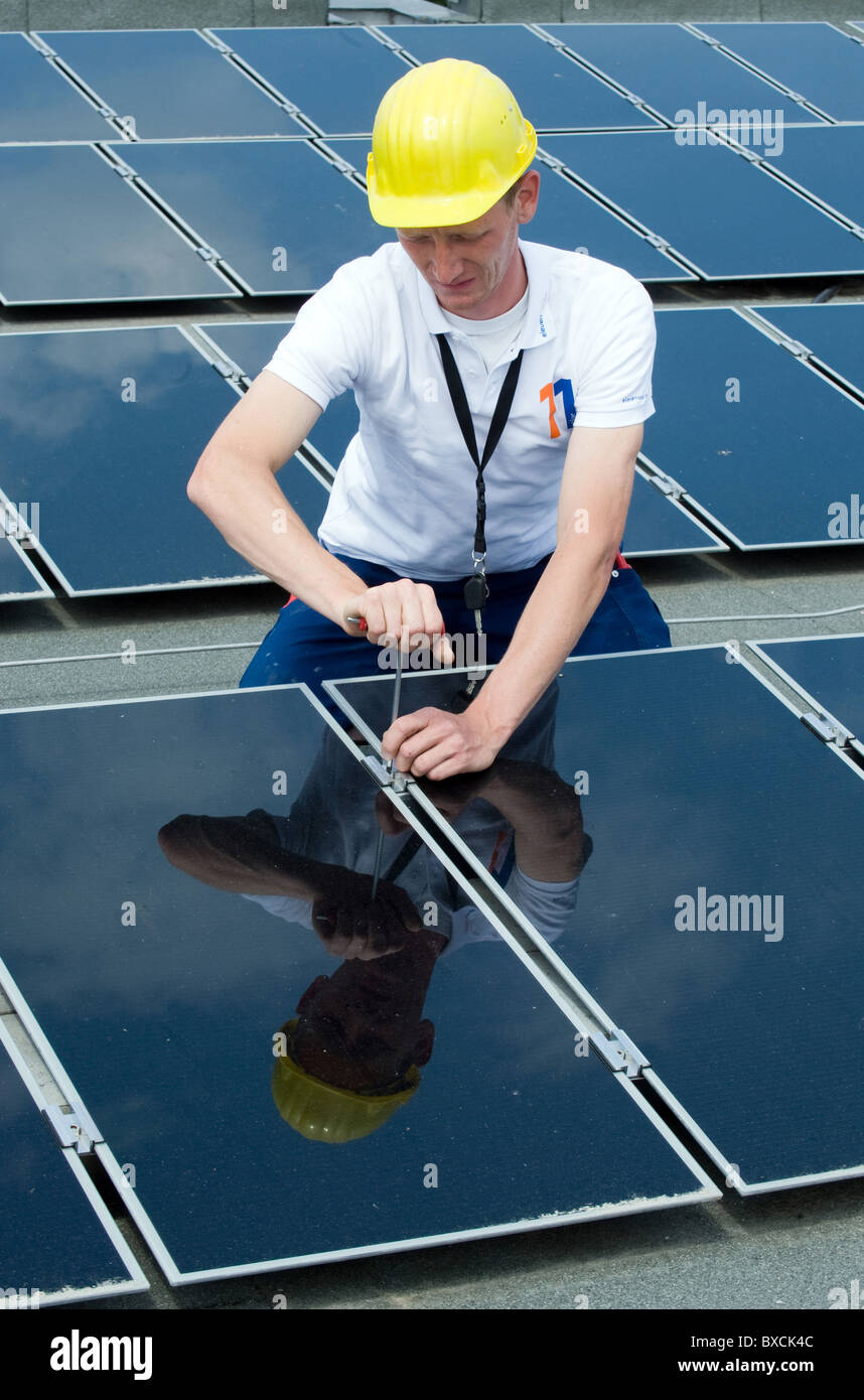 Introduction and implementation of the largest solar plant in Berlin on the roof of Tegel waterworks, Berlin, Germany Stock Photo