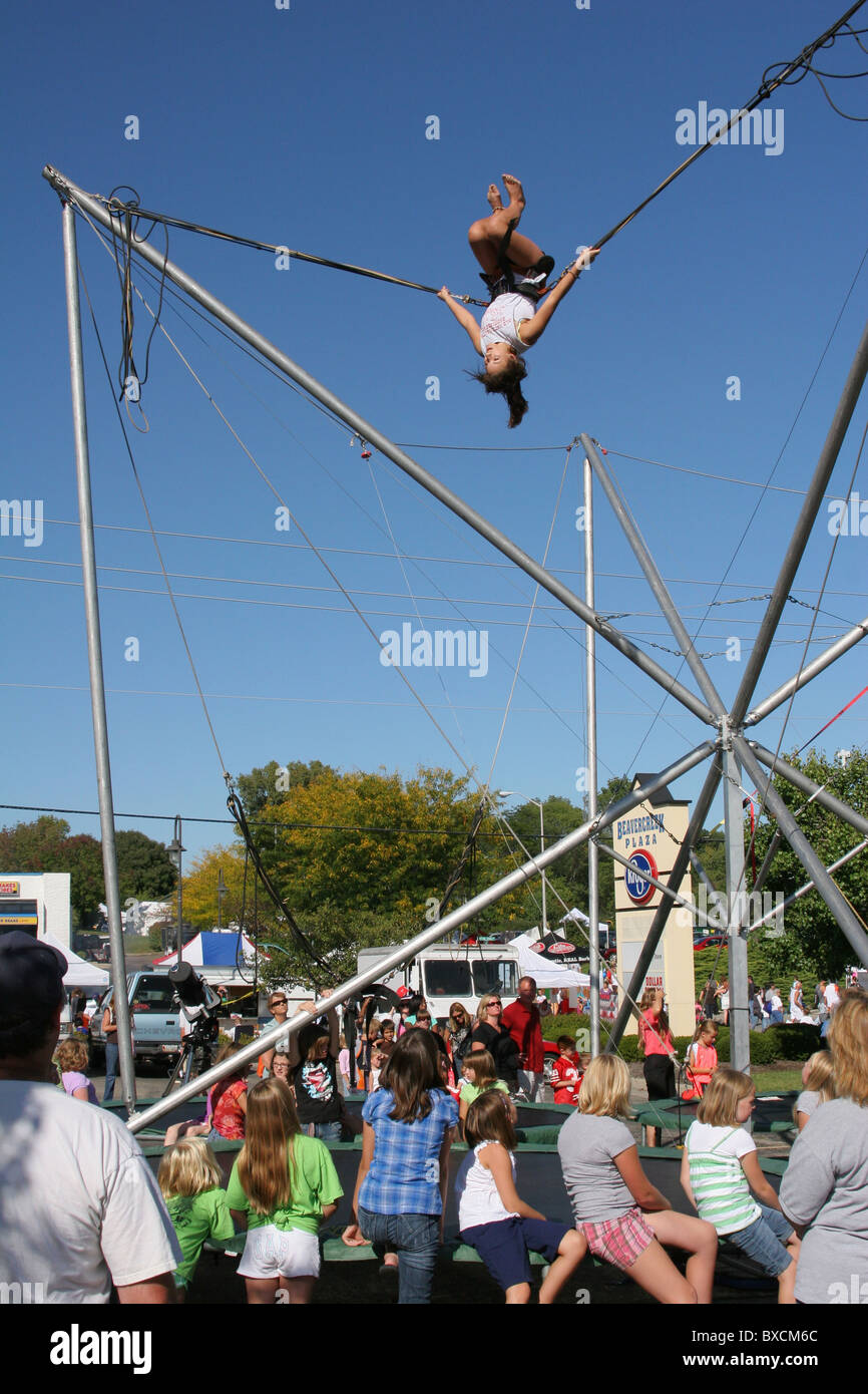 Bungee cord jumping carnival attraction. Beavercreek Popcorn Festival