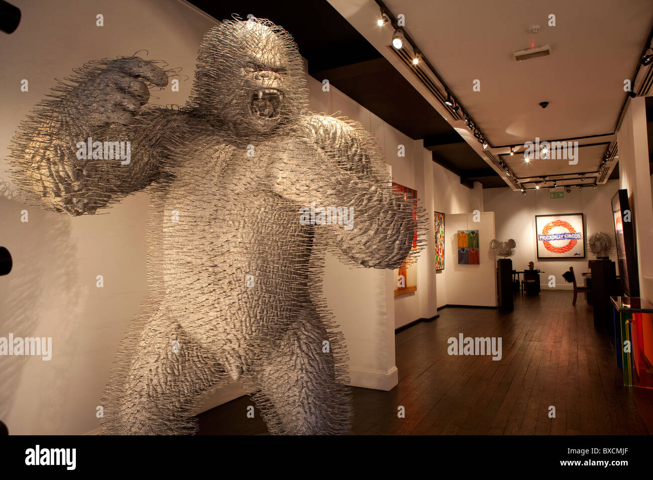 The Opera gallery in New Bond Street, London. Gorilla made of coat hangers by artist David Mach. Stock Photo