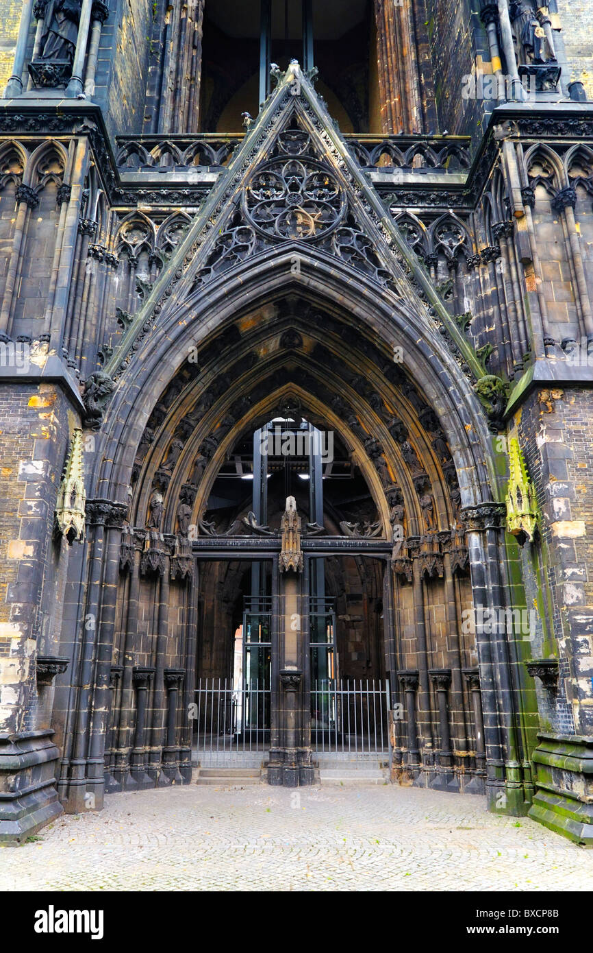 A main gate (closed off) to the ruins of the Gothic Revival Church of St. Nicholas (St.-Nikolai-Kirche) in Hamburg, Germany. Stock Photo