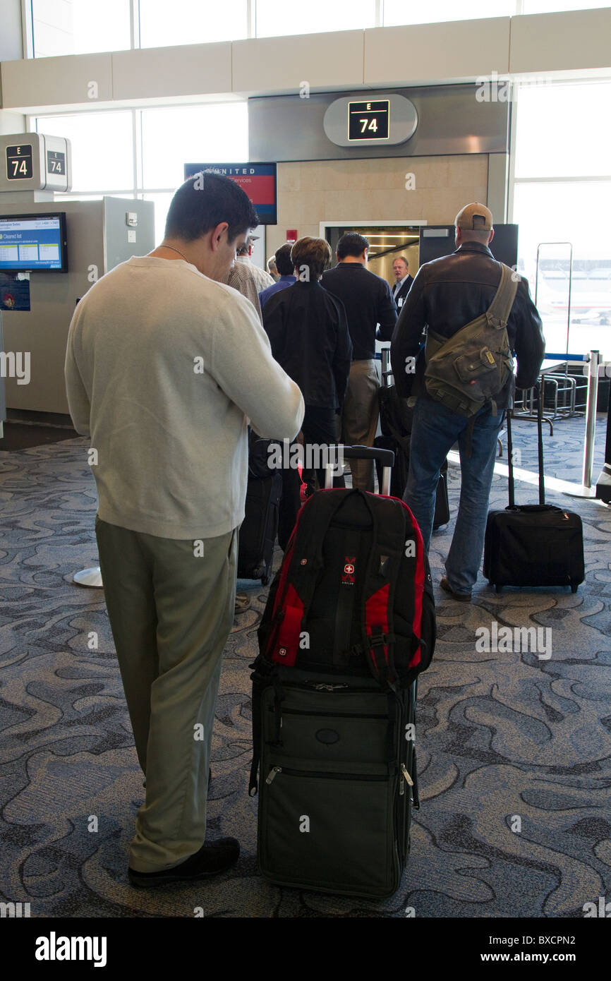 Travelers queue up to board a plane, Tampa International Airport, USA Stock Photo