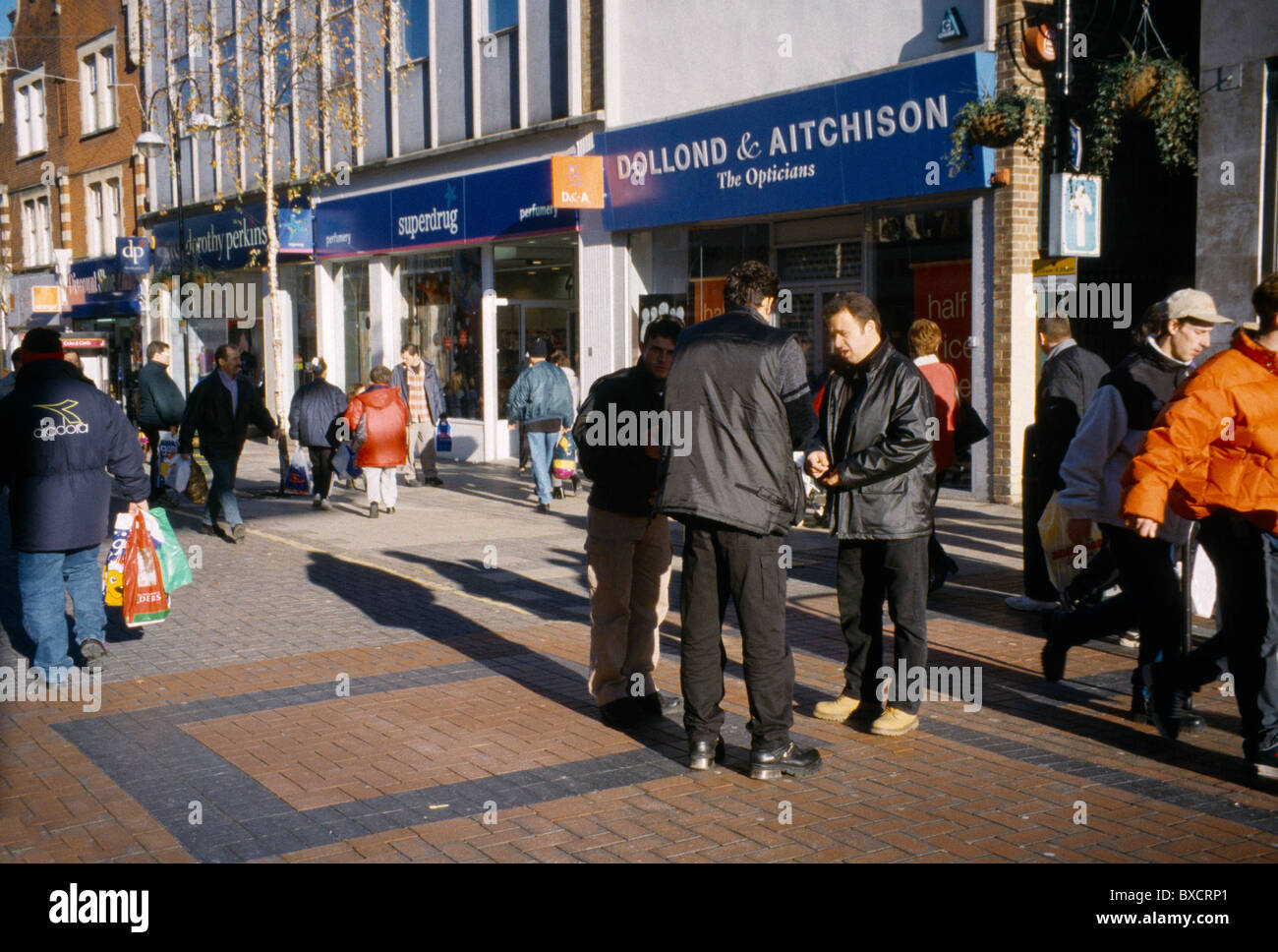 People Talking in High Street Sutton Surrey Stock Photo