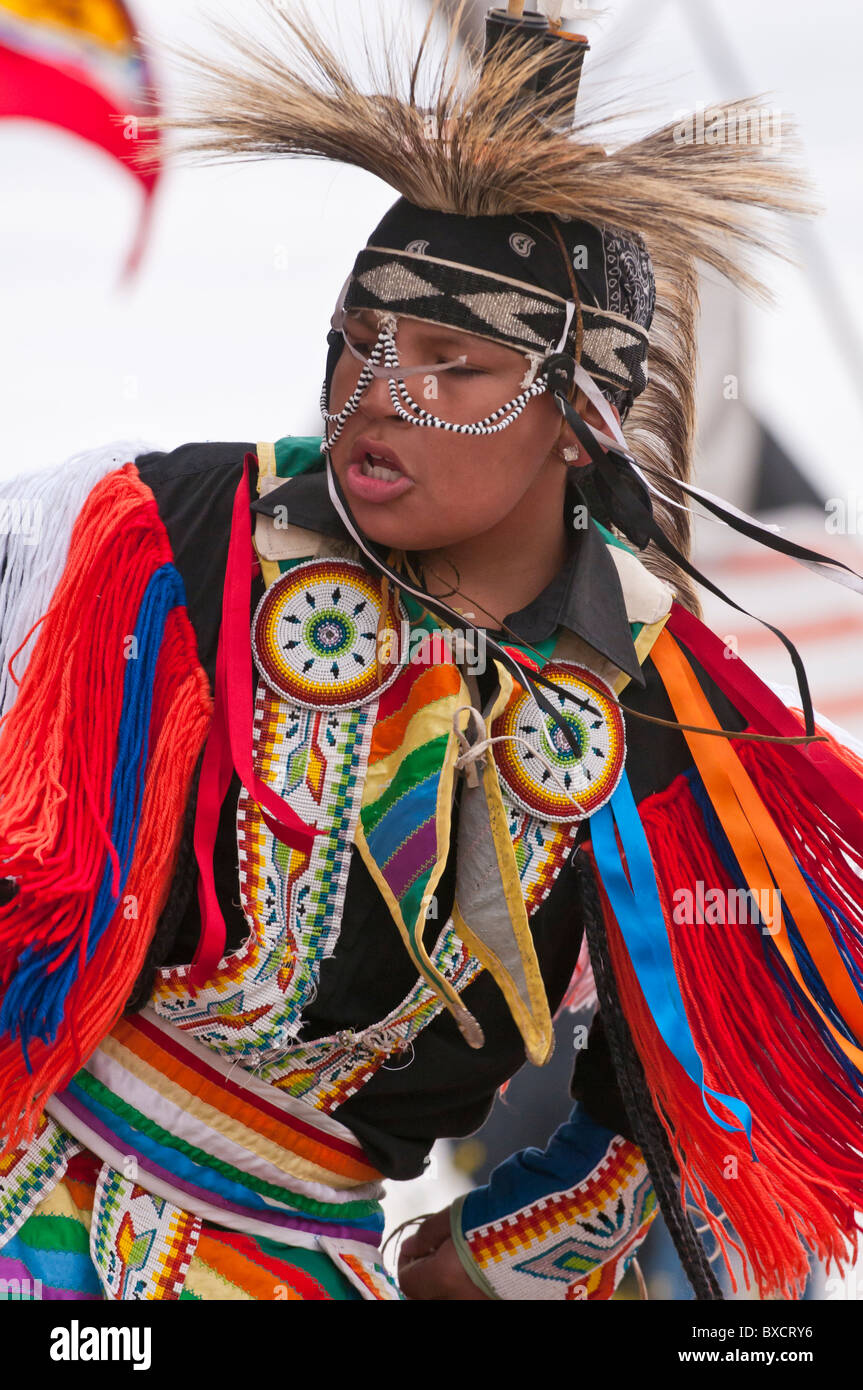 Young boy in traditional regalia, Powwow, Blackfoot Crossing Stock
