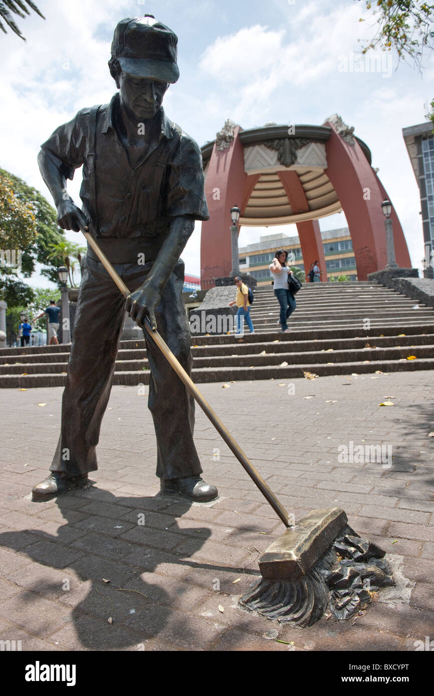 Statue of workman sweeping the street in San Jose Costa Rica Stock Photo Alamy