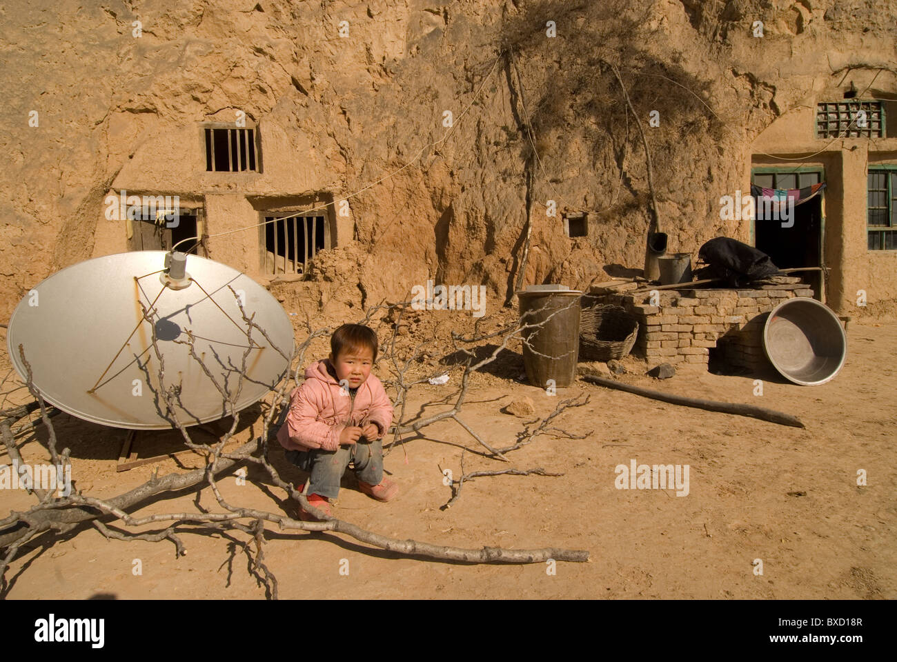 Traditional cave dwellings in Shaanxi province, China. With satellite dish. Stock Photo