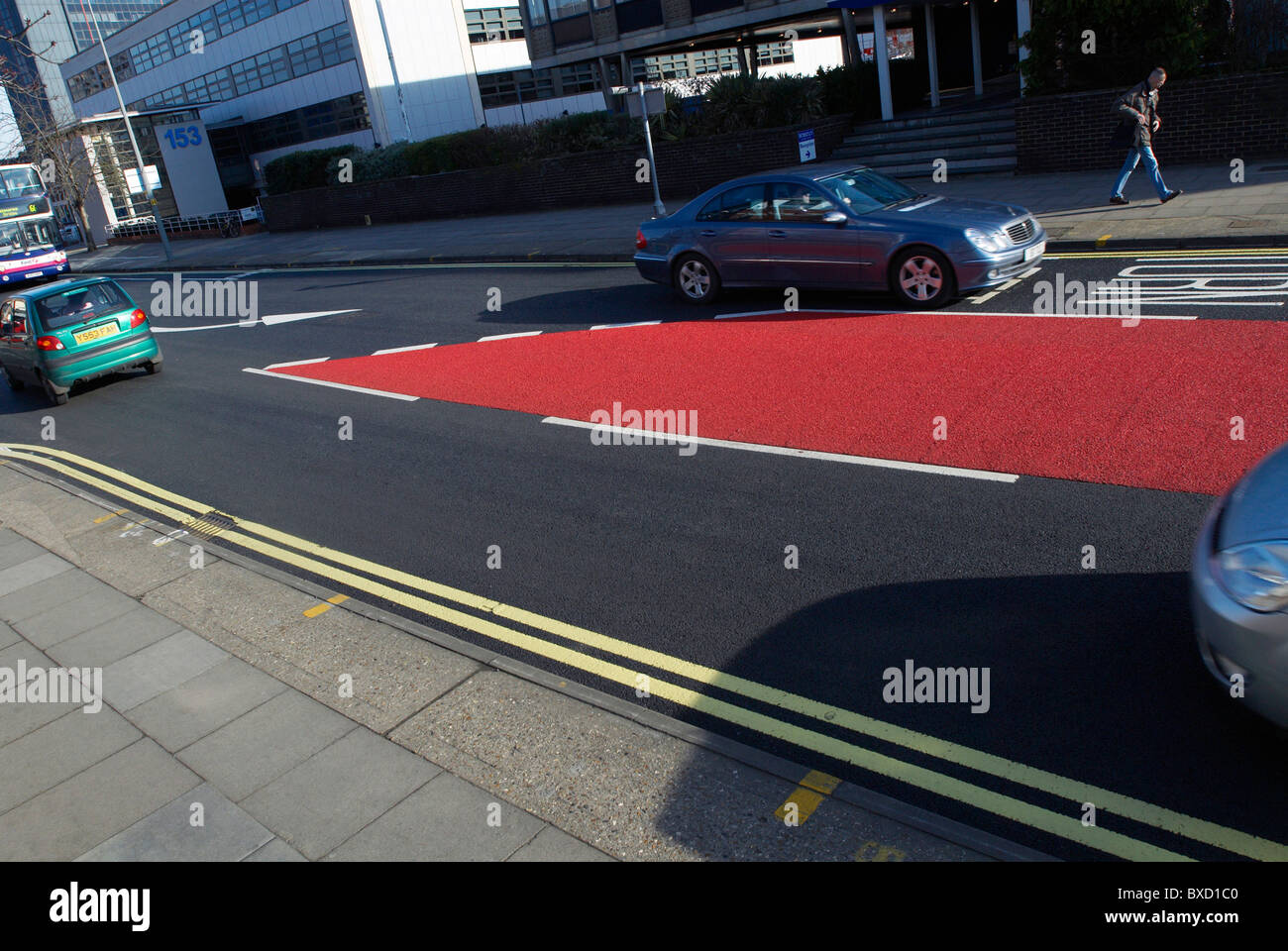 Coloured asphalt bus lane Ipswich United Kingdom Stock Photo
