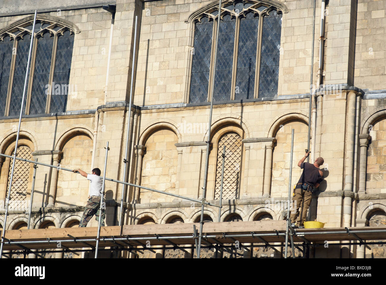 Erecting scaffolding around Norwich Cathedral UK Stock Photo Alamy