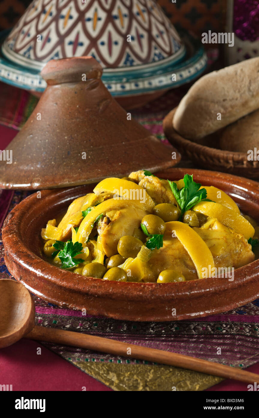 Tagine of chicken with green olives and lemon. Morocco Food Stock Photo