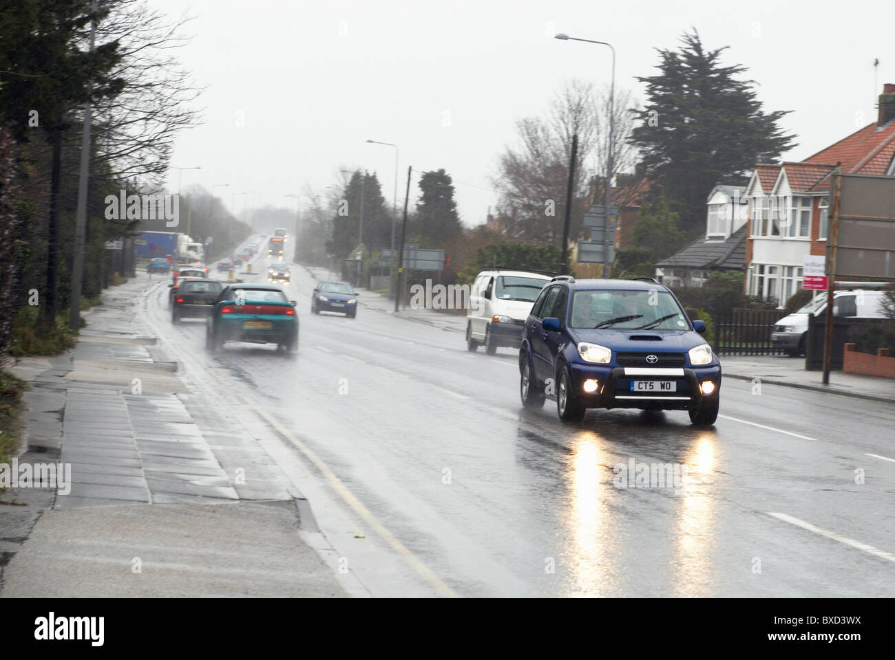 Wet weather driving conditions Suffolk UK Stock Photo