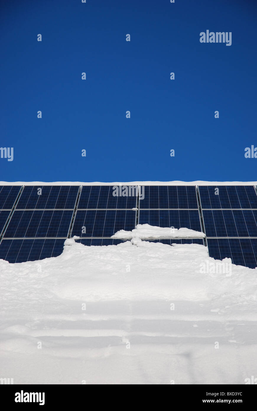 Snowcovered solar panels Stock Photo Alamy