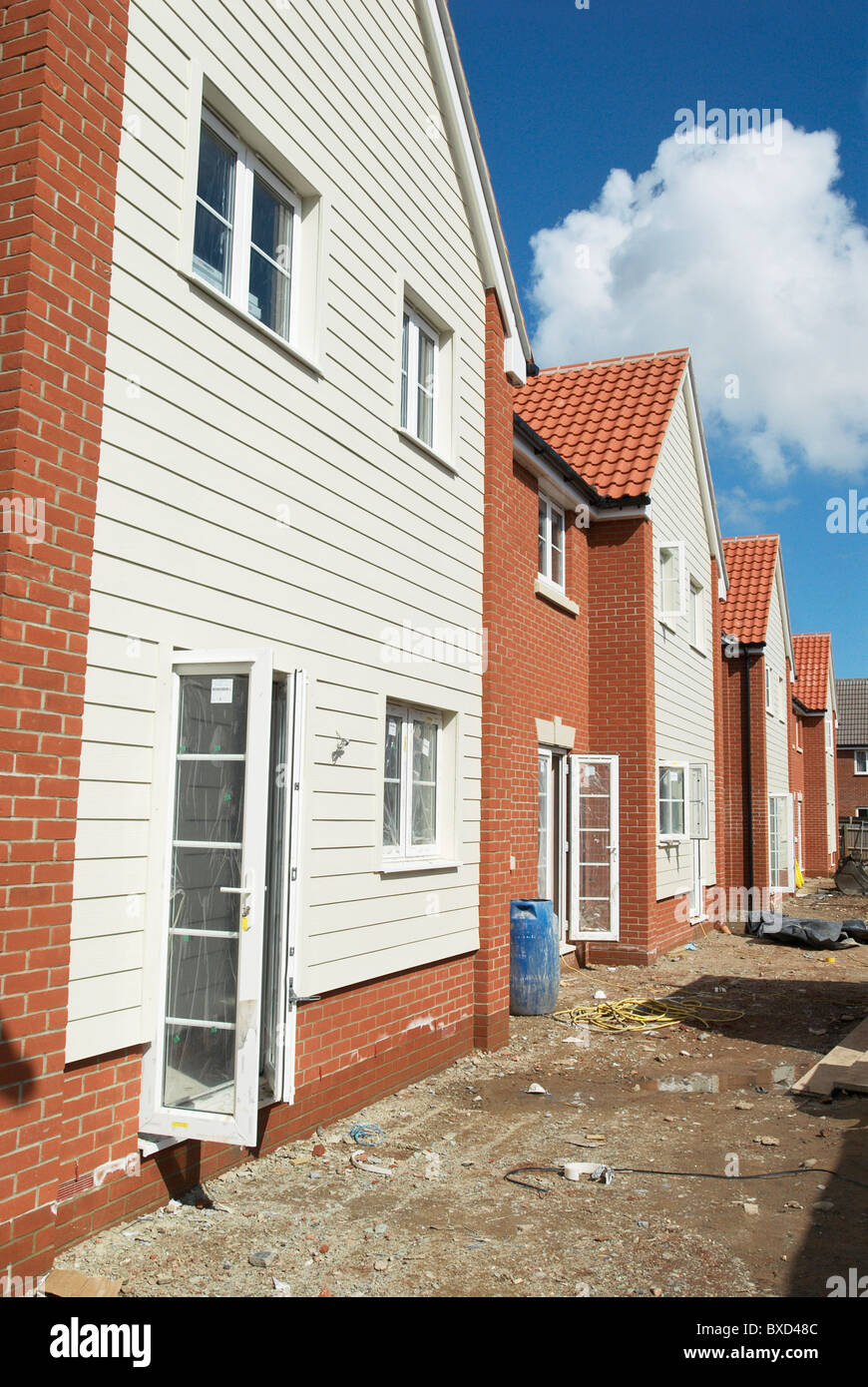 Weather-boarded new homes under construction Ipswich UK Stock Photo