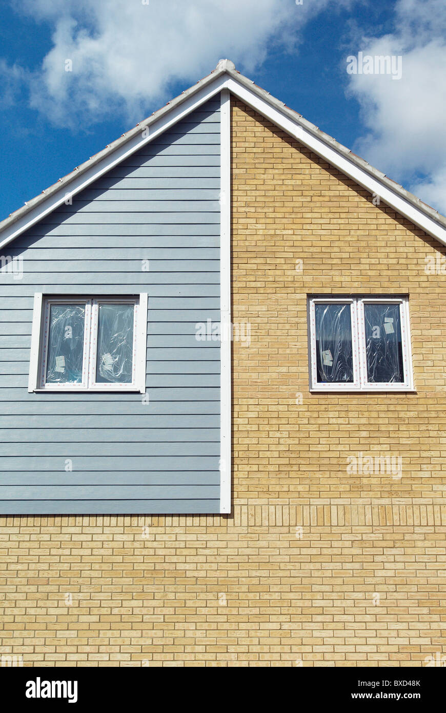 Weather-boarded new homes under construction Ipswich UK Stock Photo