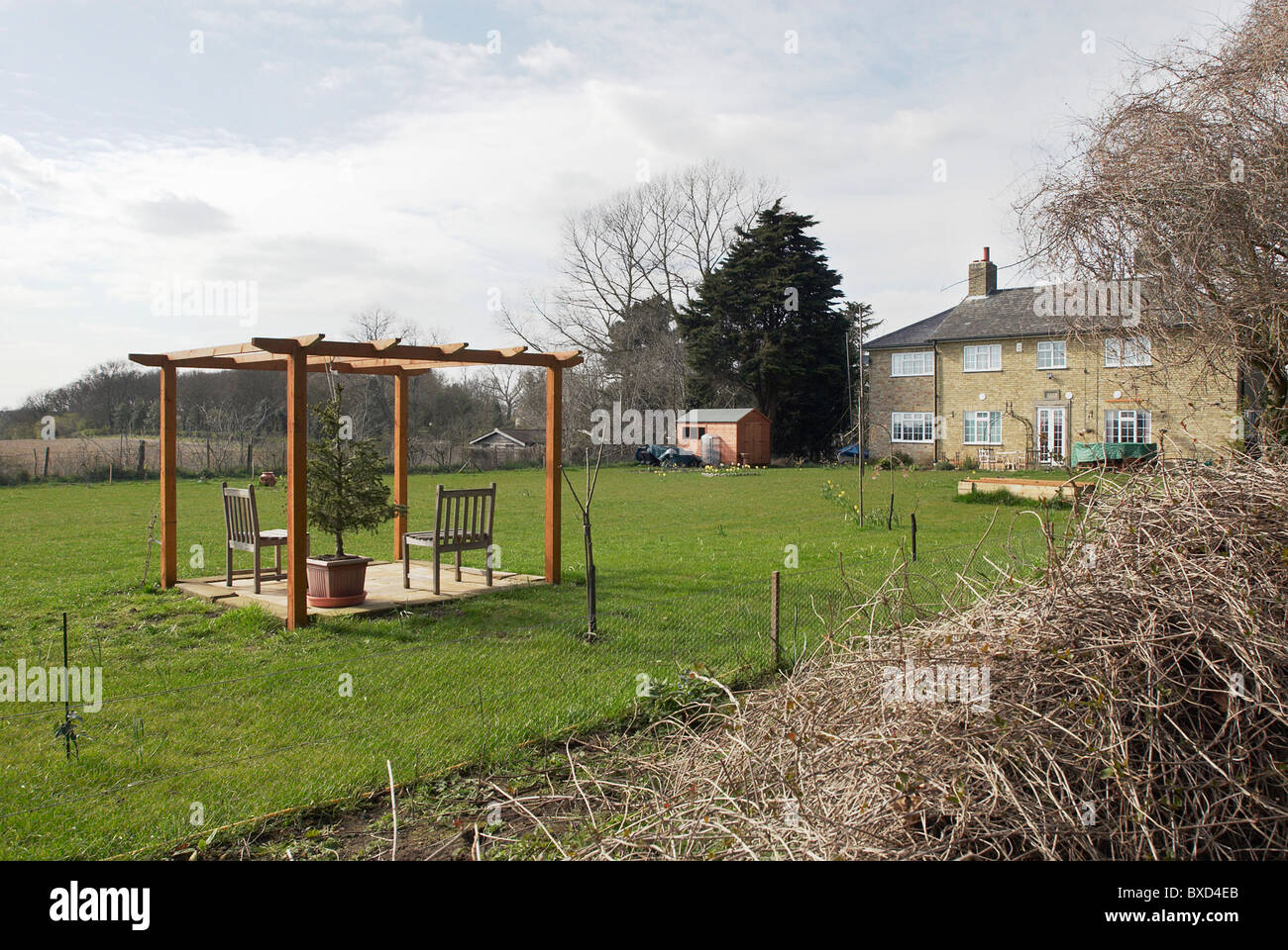 Back garden seating and framed area Stock Photo