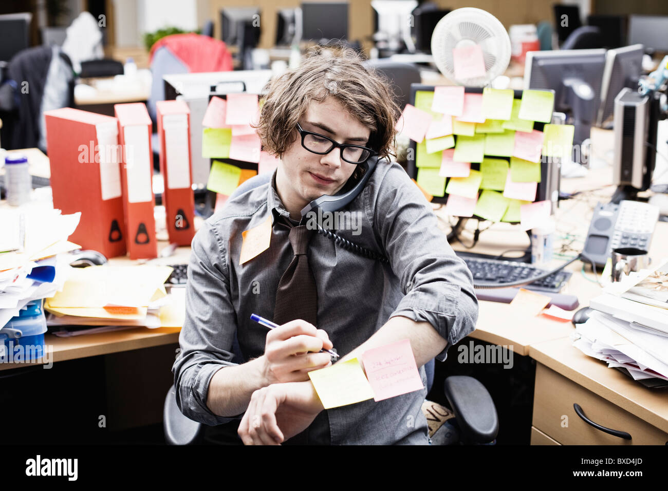 young Call center office frustration stress work Stock Photo
