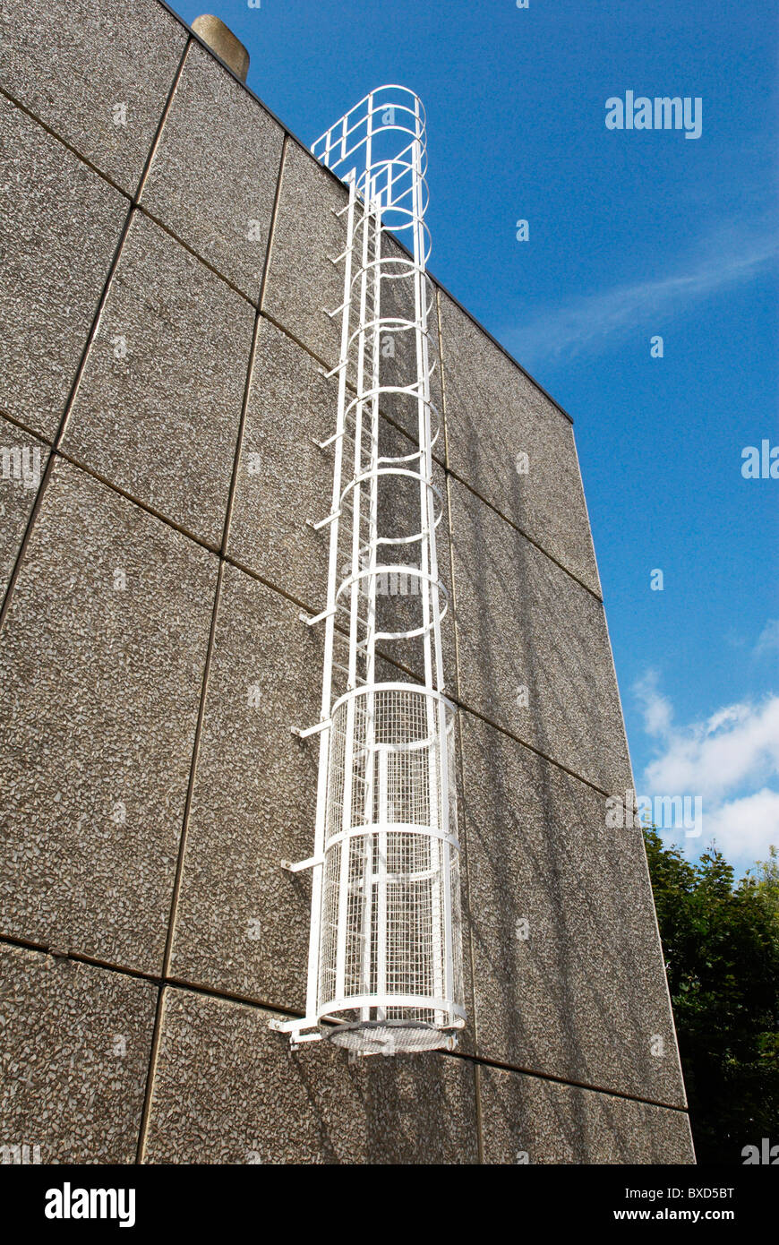 Fire escape ladder from the roof of a building South London UK Stock Photo