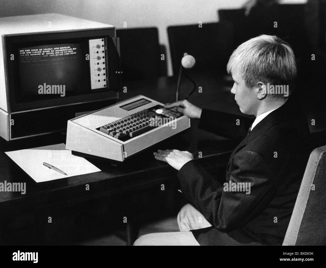 education, school, boy working with computer, lesson without teacher, vision of the future, circa 1970, Additional-Rights-Clearences-Not Available Stock Photo