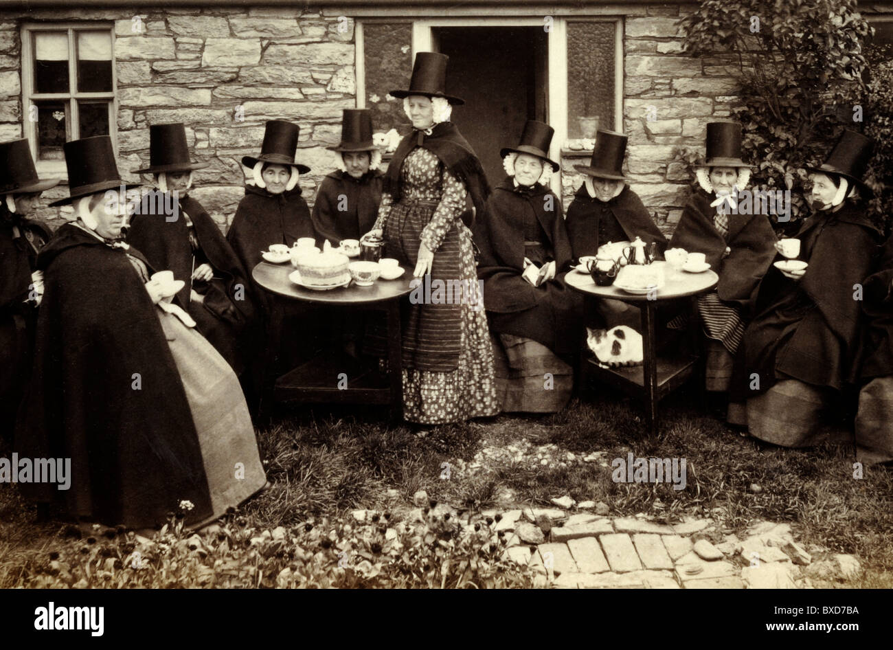 Welsh Women in National Dress or Folkloric Costume Drinking Tea or