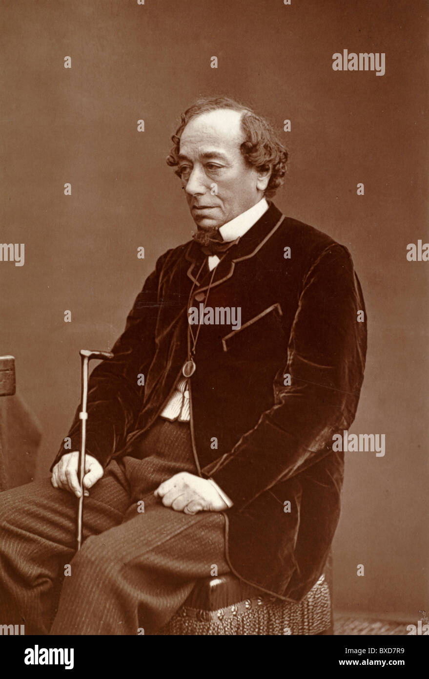 Portrait Benjamin Disraeli (1804-81) British Conservative Politician and Prime Minister Seated with Walking Stick. Vintage Albumen Print or Photograph c1870. Stock Photo