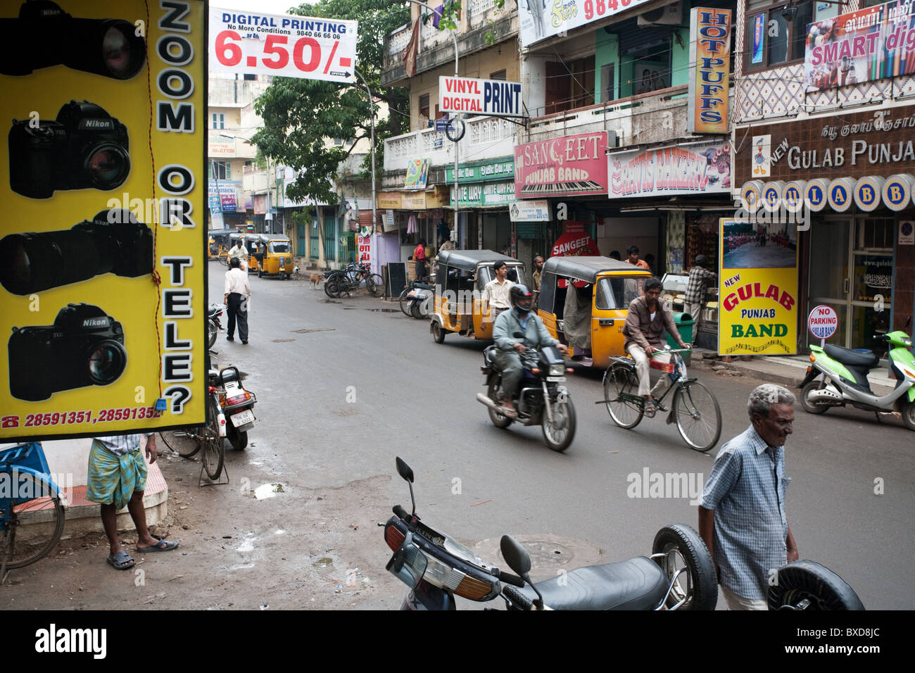 A street scene with a camera shop in Chennai, Tamil Nadu, India Stock