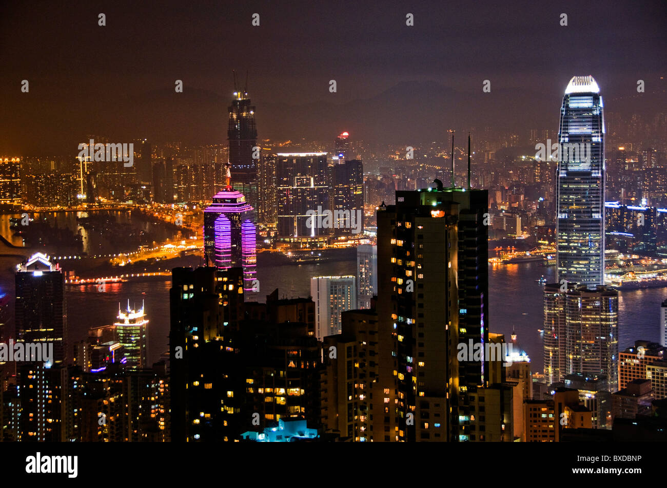 City skyline of downtown Hong Kong China at night from Victoria Peak Stock Photo
