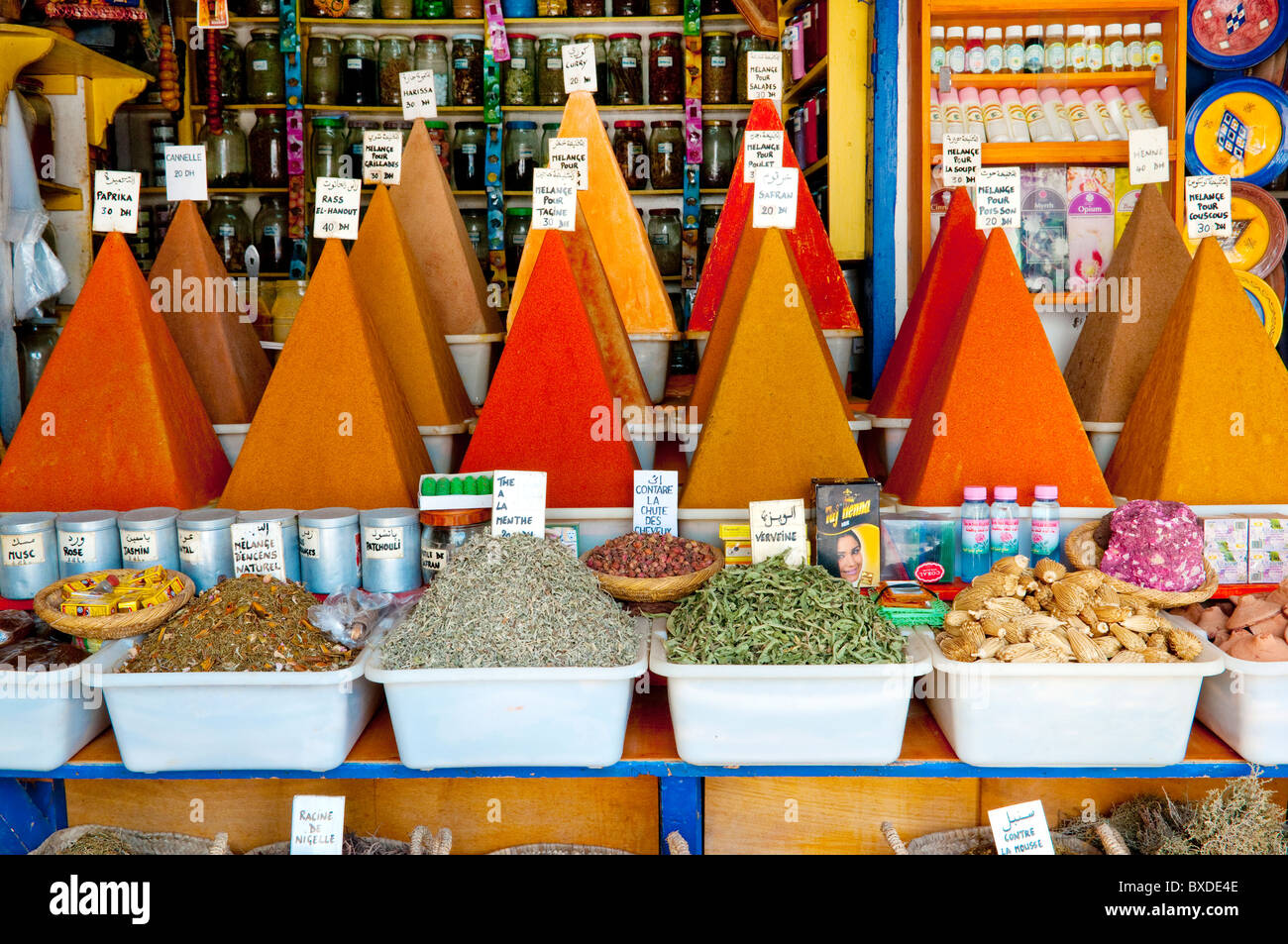 A colorful display of spices in pyramid shaped piles in the souq market of Essaouira, Morocco. Stock Photo
