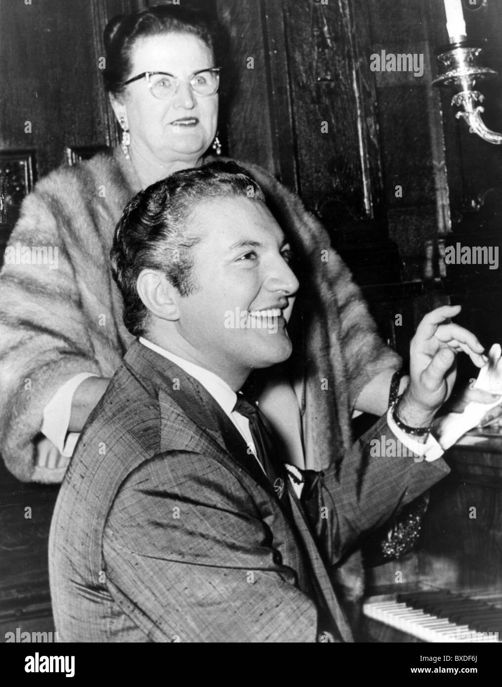LIBERACE (1919-1987) US entertainer with his mother Frances Stock Photo