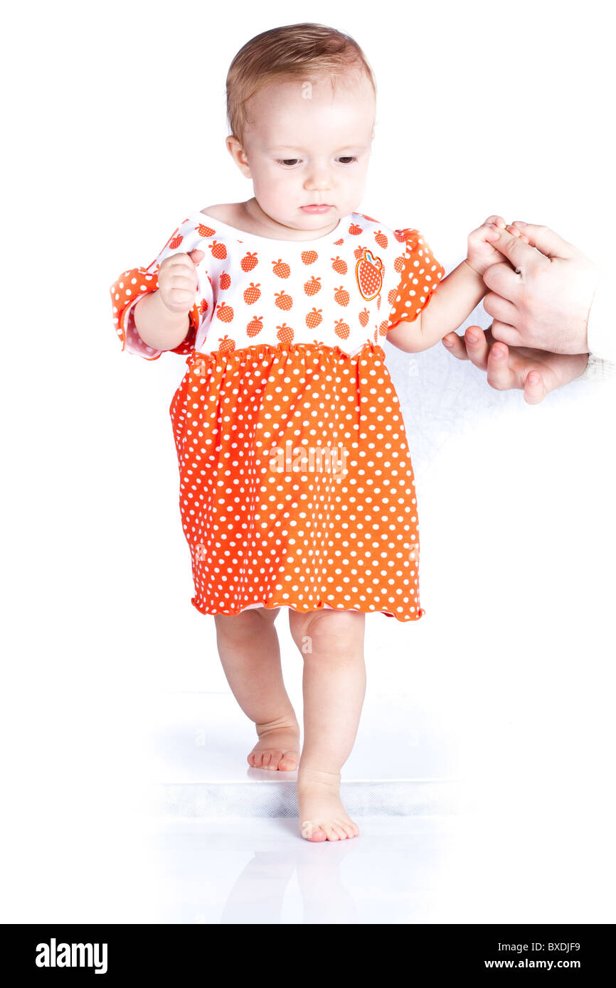 Baby in studio against a white background. Stock Photo