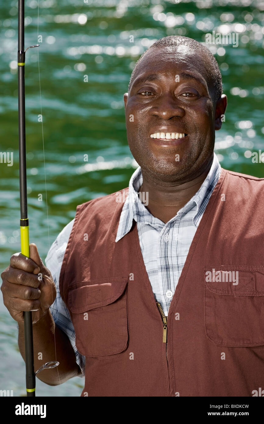 black man fishing with pole Black man fishing hi-res stock photography and images