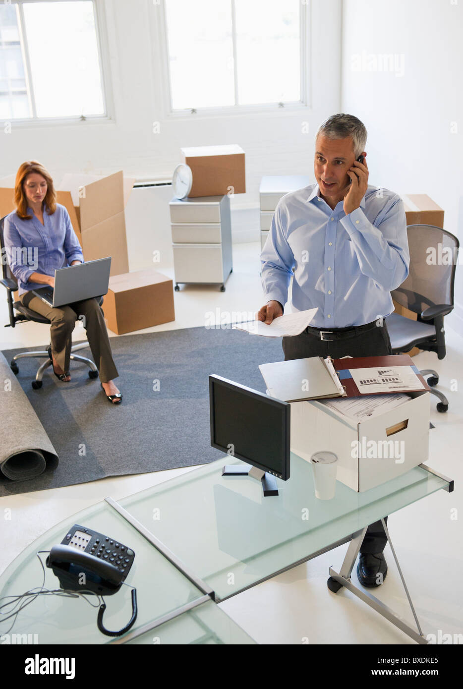 Business entrepreneurs working in startup office Stock Photo - Alamy