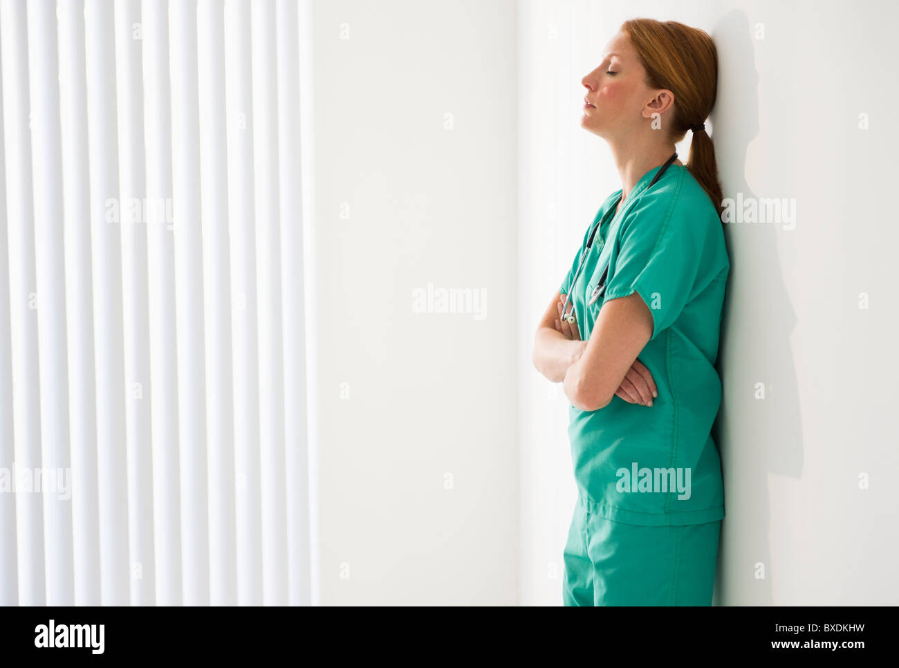 Tired doctor hi-res stock photography and images - Alamy