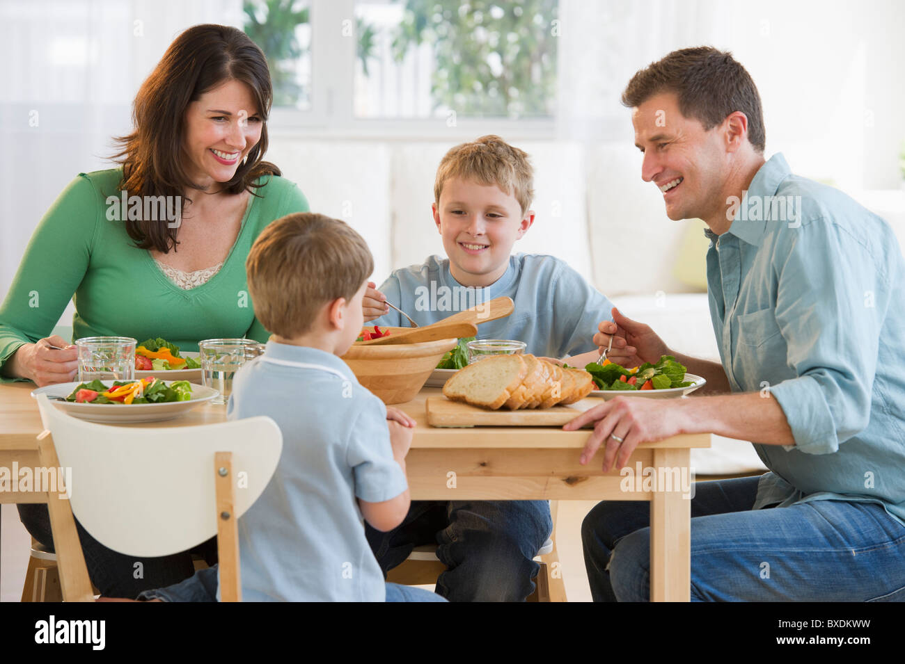 Family eating dinner Stock Photo