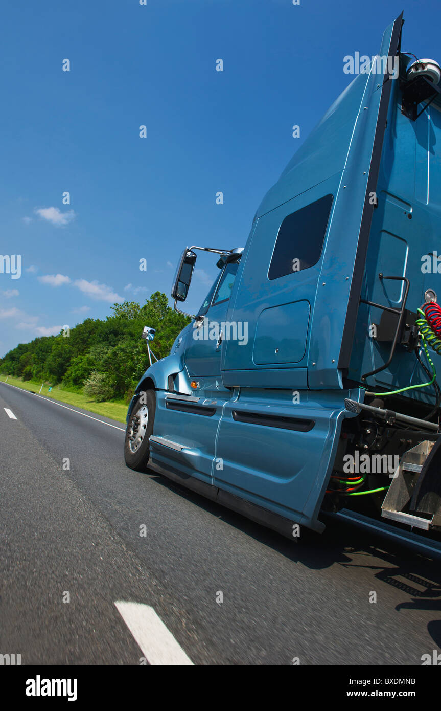 Transport truck on highway Stock Photo - Alamy