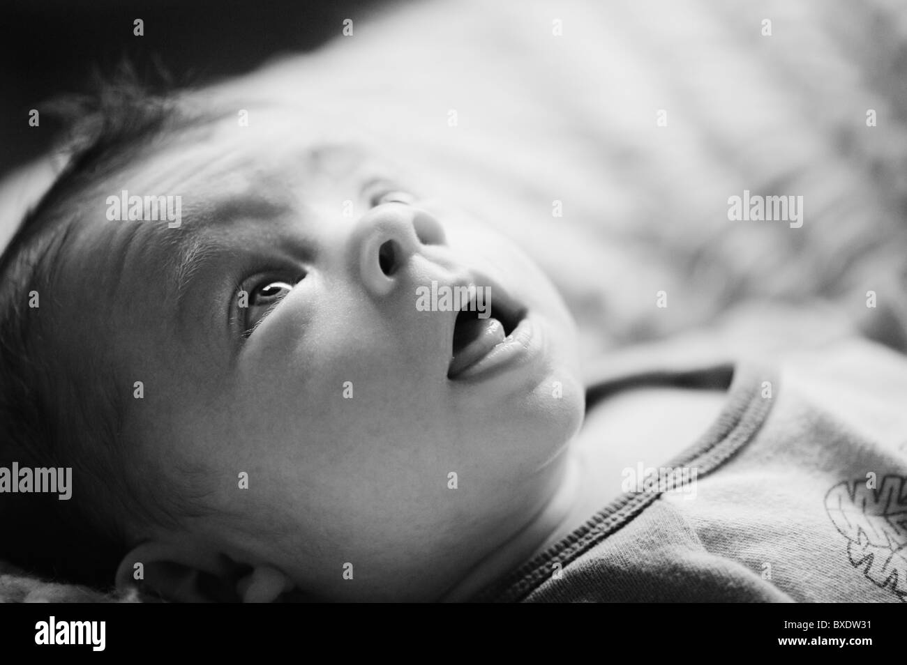 Baby lying down Stock Photo Alamy