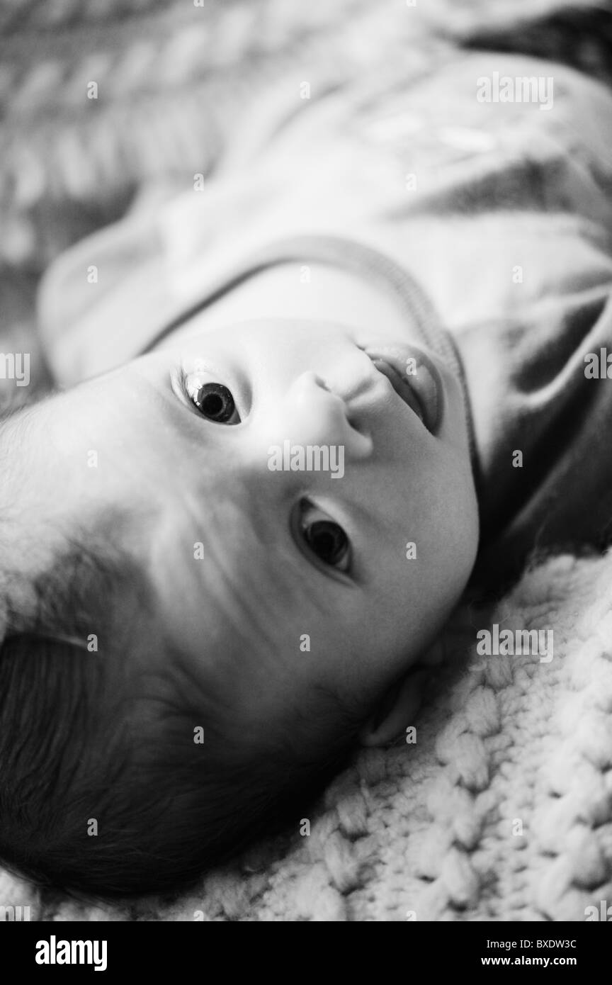 Baby lying down Stock Photo