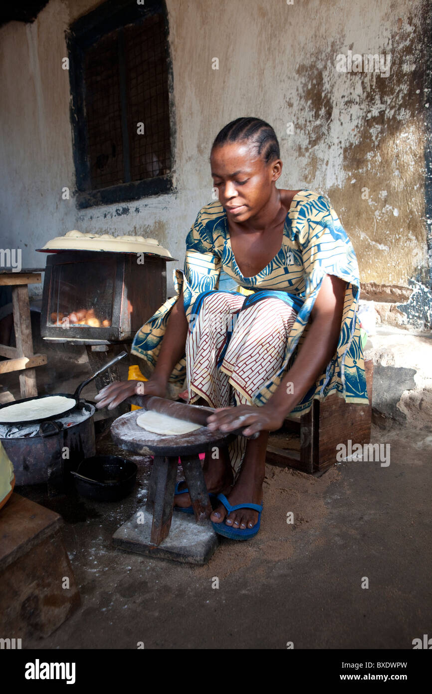 A woman (Ms. Scolastica Rister) cooks chapati in a restaurant in Dodoma, Tanzania, East Africa. Stock Photo