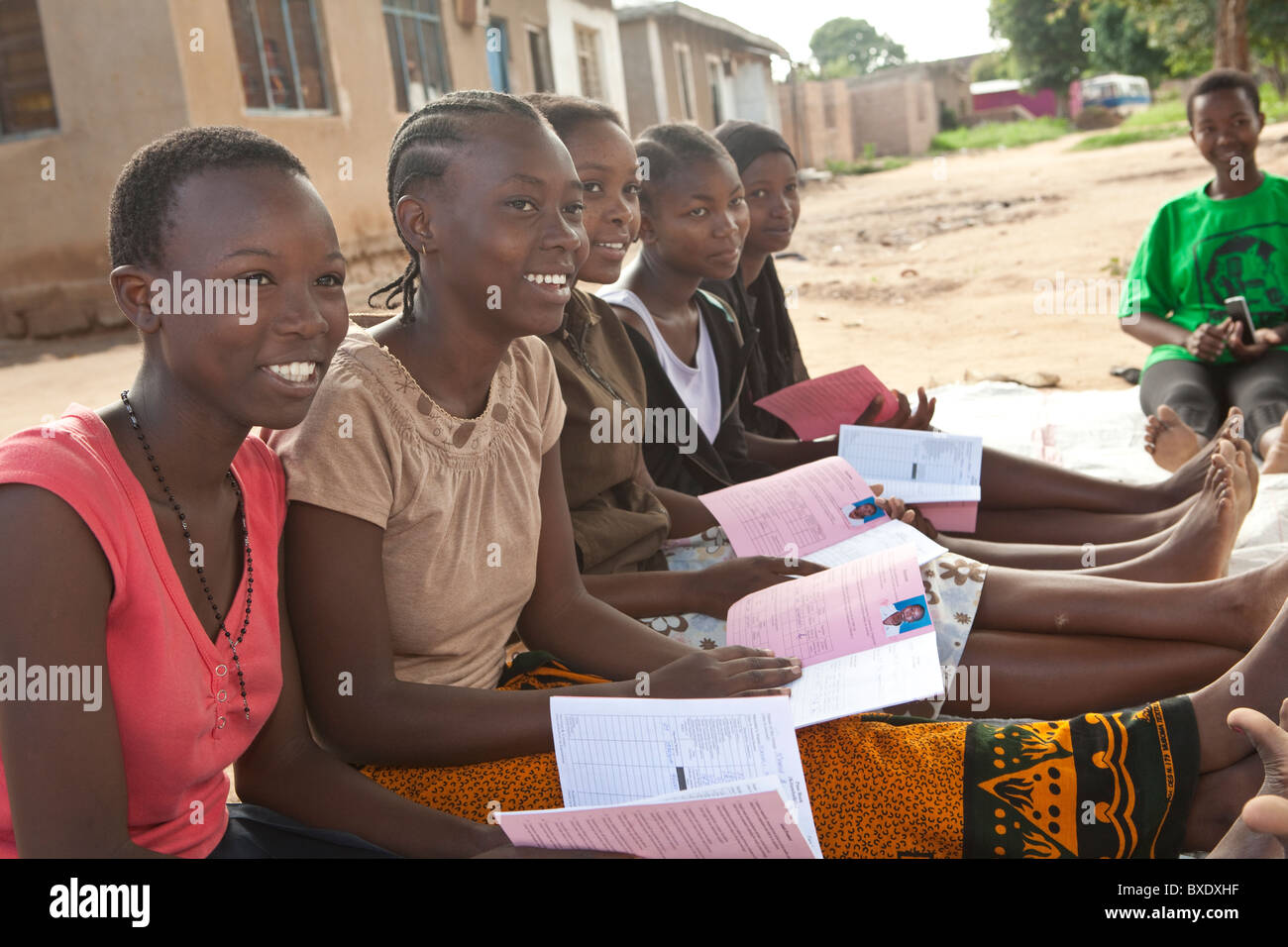 Teenage girls attend a community meeting in Dodoma, Tanzania, East Africa. Stock Photo