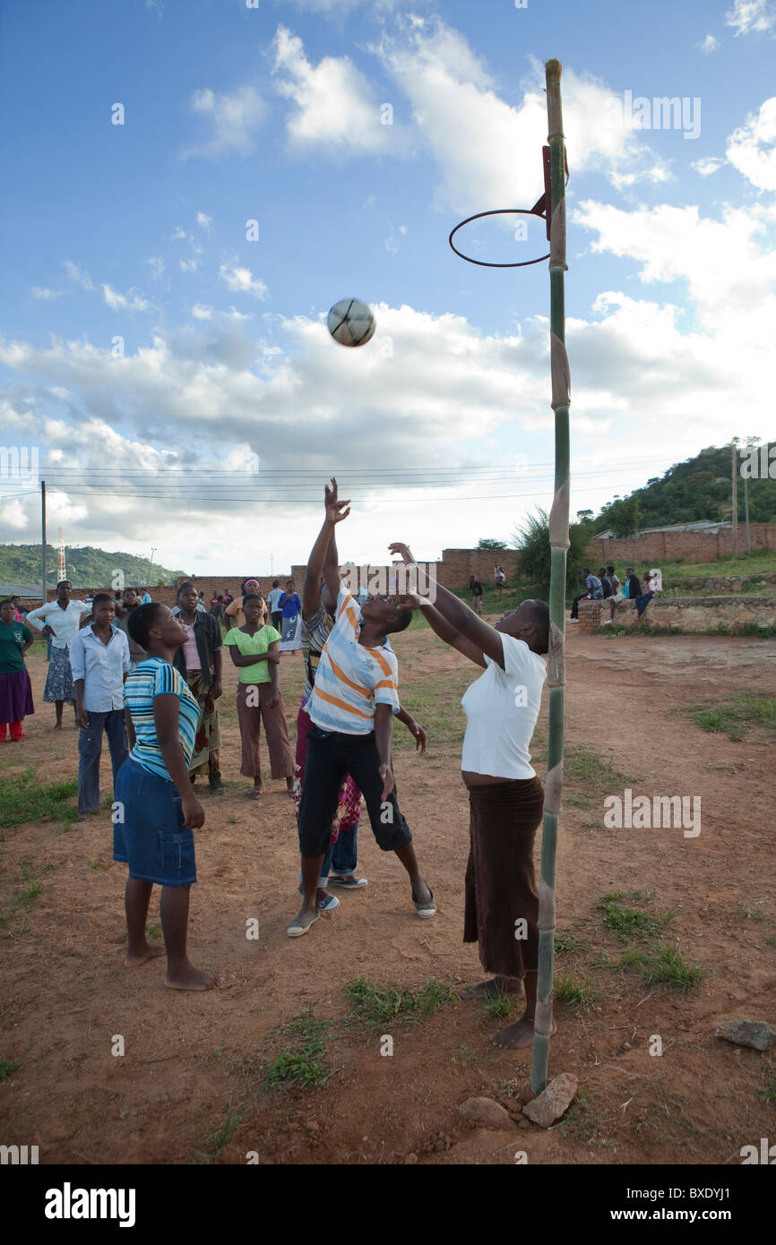 Adolescent girls play basketball at an after school program in Iringa, Tanzania, East Africa. Stock Photo