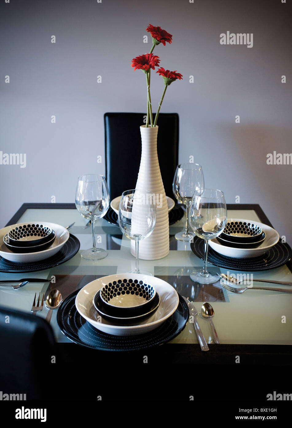 Elegant tablewear on dining room table Stock Photo