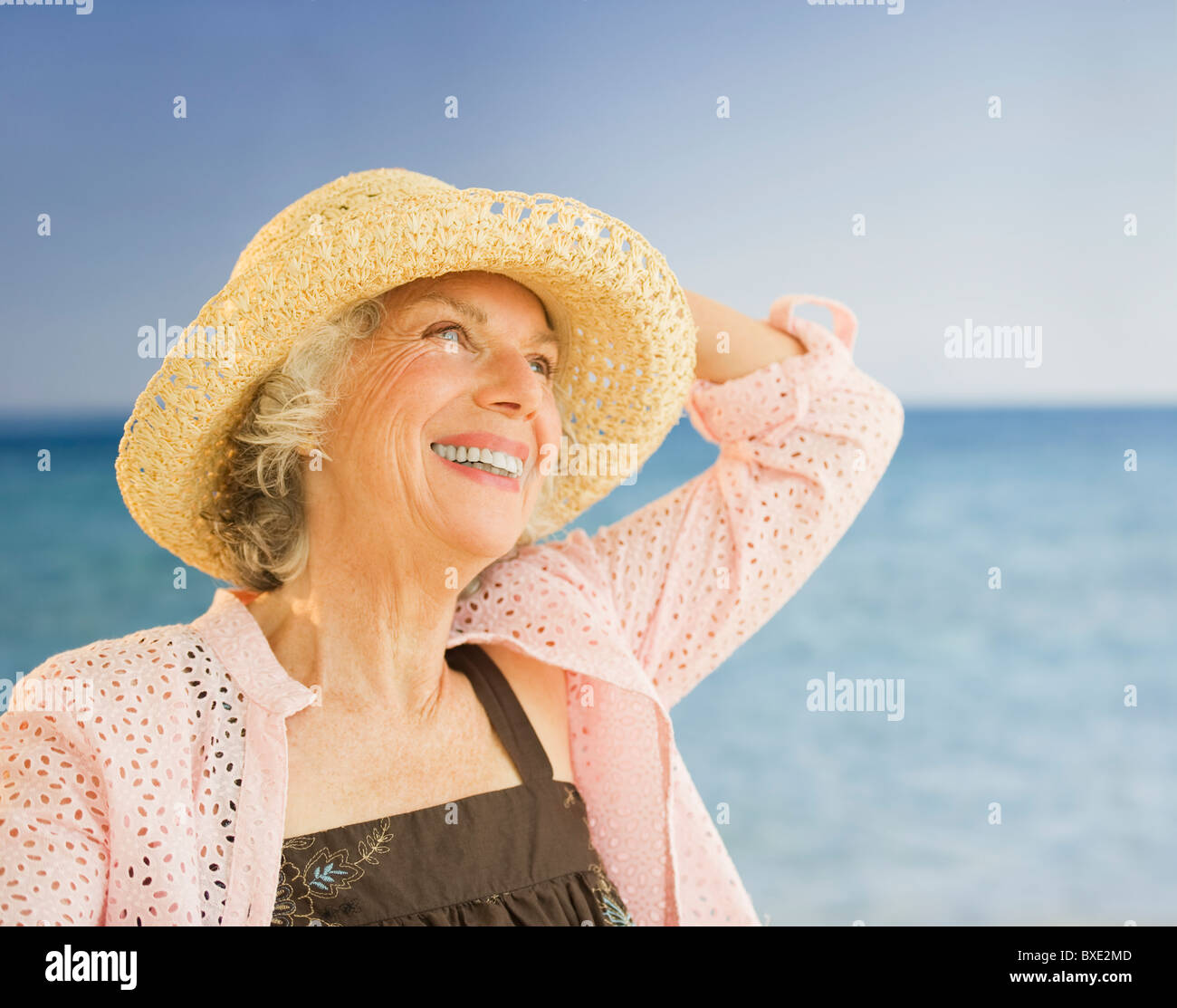 Happy woman at the beach Stock Photo - Alamy