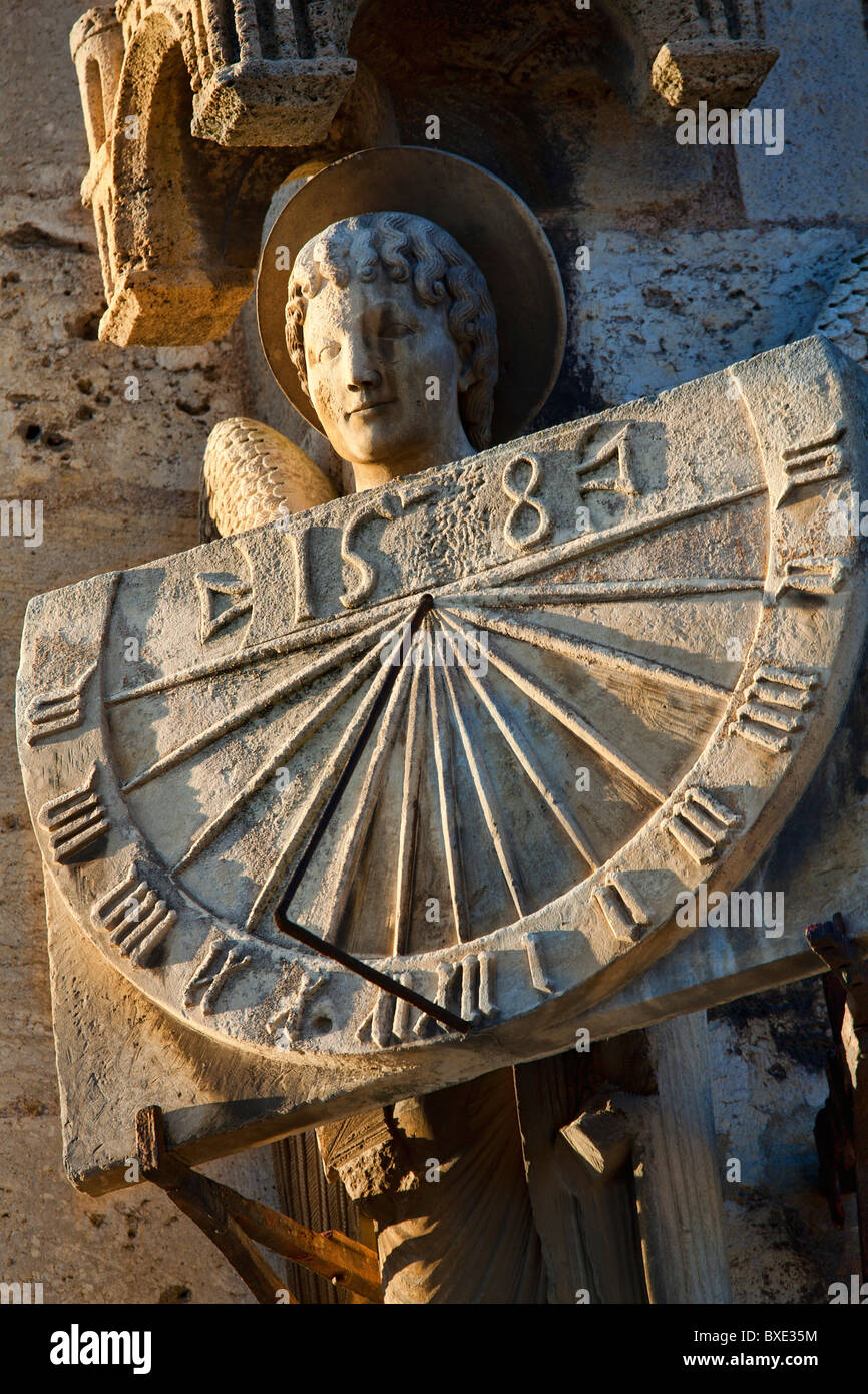 Angel with Sundial from Cathedral of Notre Dame, Chartres Stock Photo